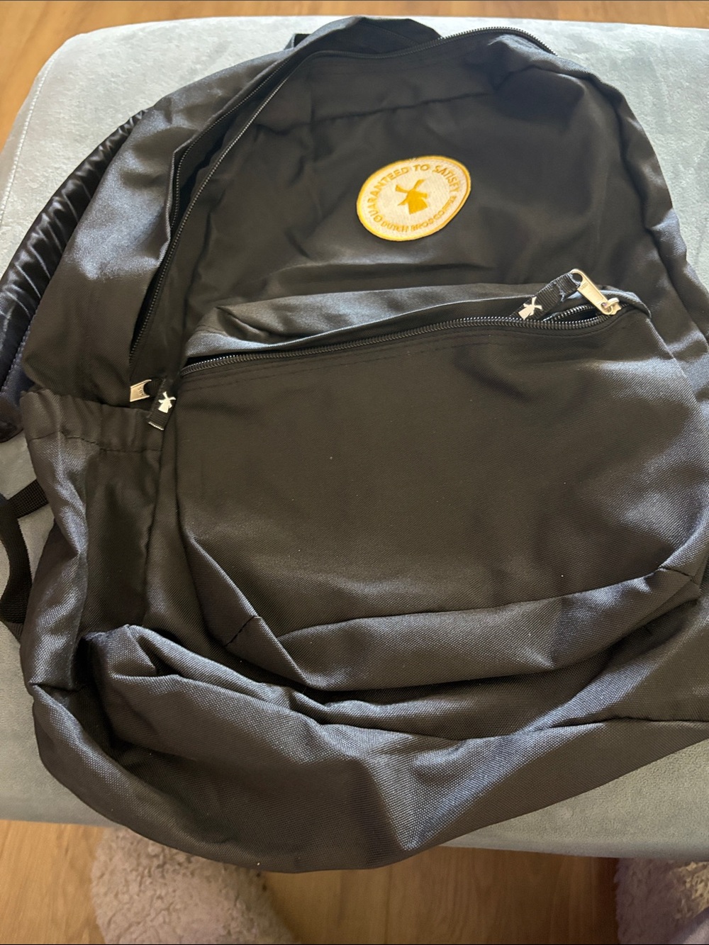 Dutch Bros Black Backpack with Yellow Patch